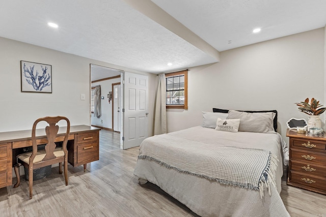 bedroom featuring recessed lighting and light wood-style flooring