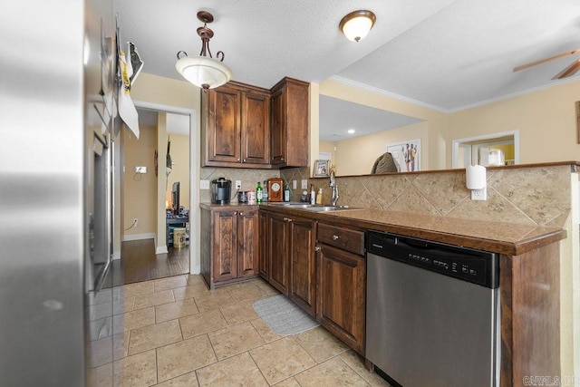 kitchen featuring a sink, backsplash, tile countertops, a peninsula, and dishwasher