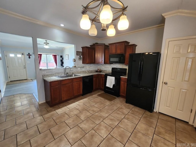 kitchen with a sink, decorative backsplash, black appliances, and ornamental molding