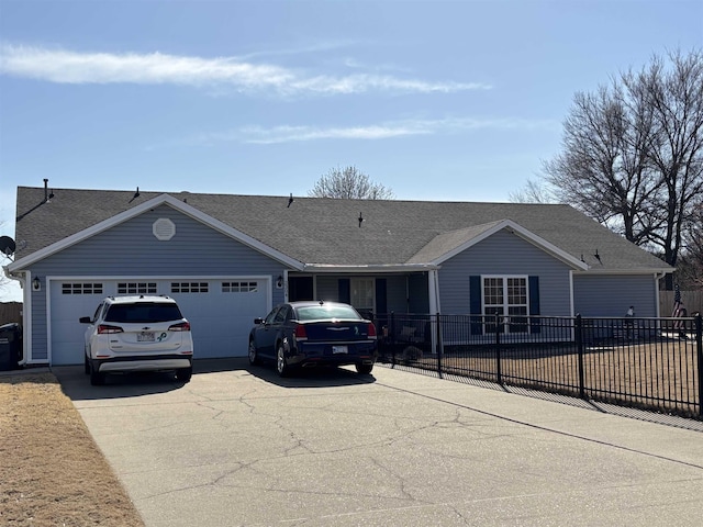 ranch-style home with a shingled roof, an attached garage, concrete driveway, and fence