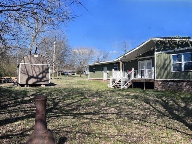 view of yard featuring a wooden deck