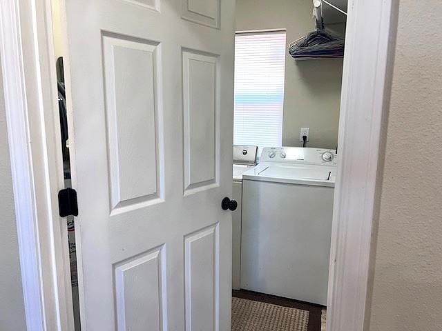 laundry area featuring laundry area and washer / clothes dryer