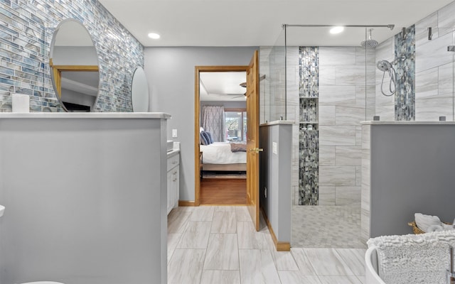 ensuite bathroom with ensuite bath, baseboards, and walk in shower