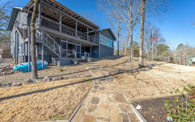 rear view of house with stairway