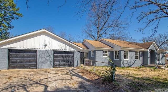 ranch-style house featuring brick siding and fence