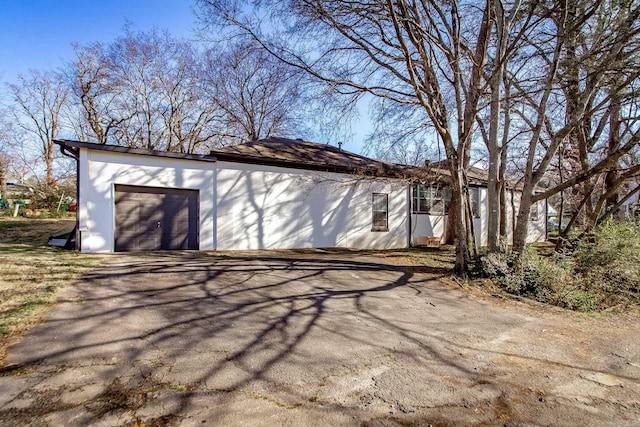 view of outbuilding featuring driveway