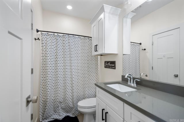 bathroom featuring visible vents, toilet, a shower with shower curtain, recessed lighting, and vanity