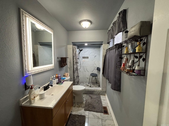 bathroom featuring vanity, visible vents, a shower stall, toilet, and marble finish floor