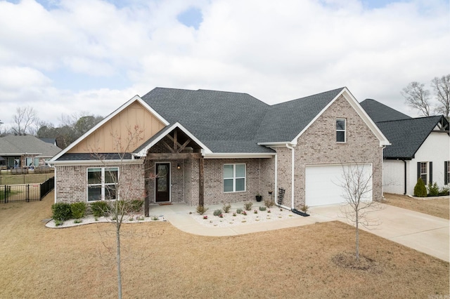 view of front of property featuring brick siding, a front lawn, fence, concrete driveway, and an attached garage