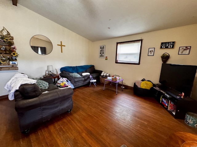 1530 Pearcy Rd, Pearcy, AR 71964 - living room featuring lofted ceiling, wood finished floors, and baseboards