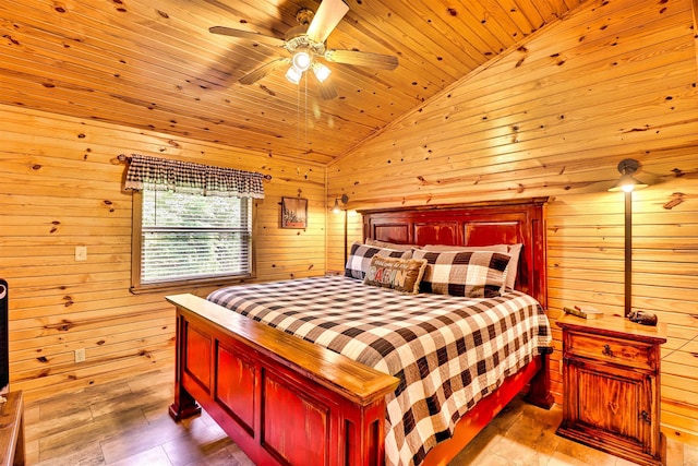 bedroom featuring wooden walls, wooden ceiling, a ceiling fan, and vaulted ceiling