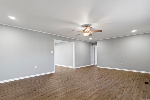 unfurnished room with wood finished floors, baseboards, recessed lighting, ornamental molding, and ceiling fan