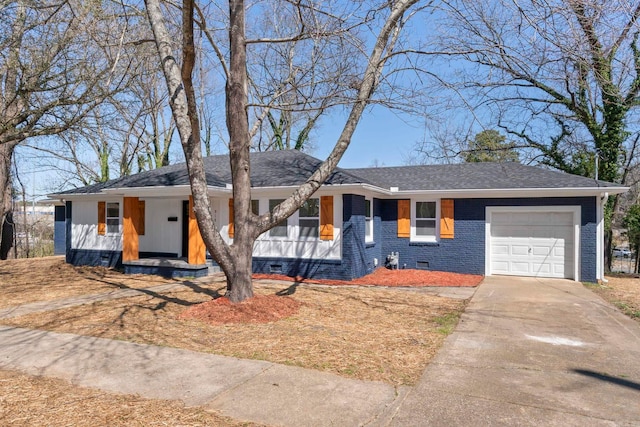 ranch-style house with a garage, driveway, a porch, crawl space, and brick siding