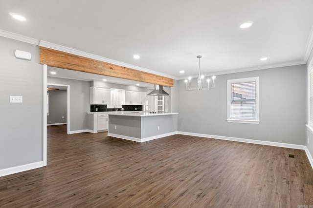 unfurnished living room featuring crown molding, baseboards, a chandelier, recessed lighting, and dark wood-style flooring