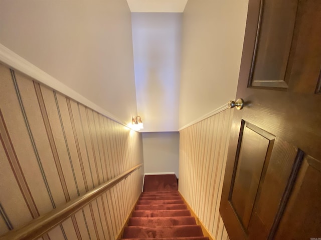 stairs with lofted ceiling