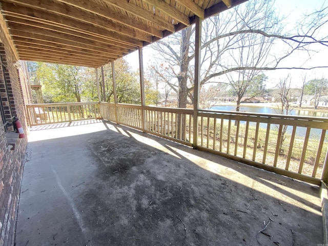 view of patio / terrace with a water view