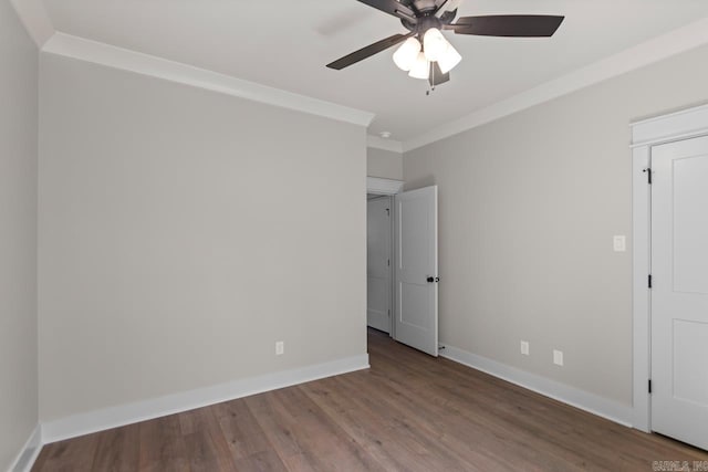 unfurnished bedroom with a ceiling fan, wood finished floors, baseboards, and ornamental molding