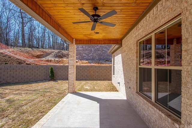 view of patio featuring a fenced backyard and ceiling fan