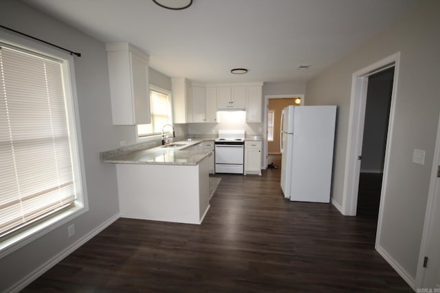 kitchen with dark wood-style floors, white appliances, white cabinetry, and a sink