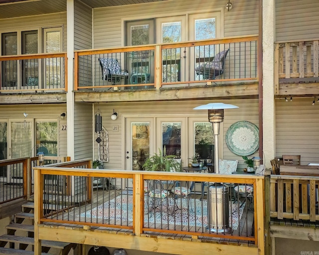 entrance to property featuring a balcony