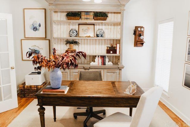 dining room with wood finished floors