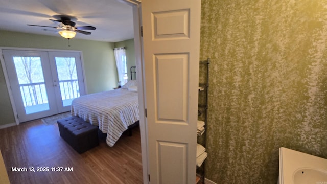 bedroom with baseboards, french doors, wood finished floors, a ceiling fan, and access to outside