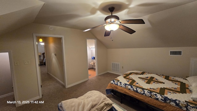 bedroom featuring visible vents, baseboards, carpet flooring, and vaulted ceiling