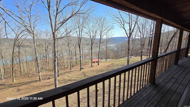 deck featuring a wooded view