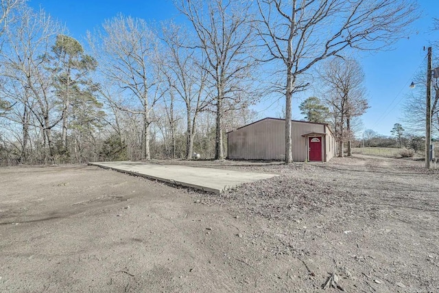 exterior space featuring an outbuilding