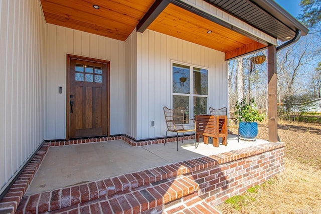 property entrance with a patio area