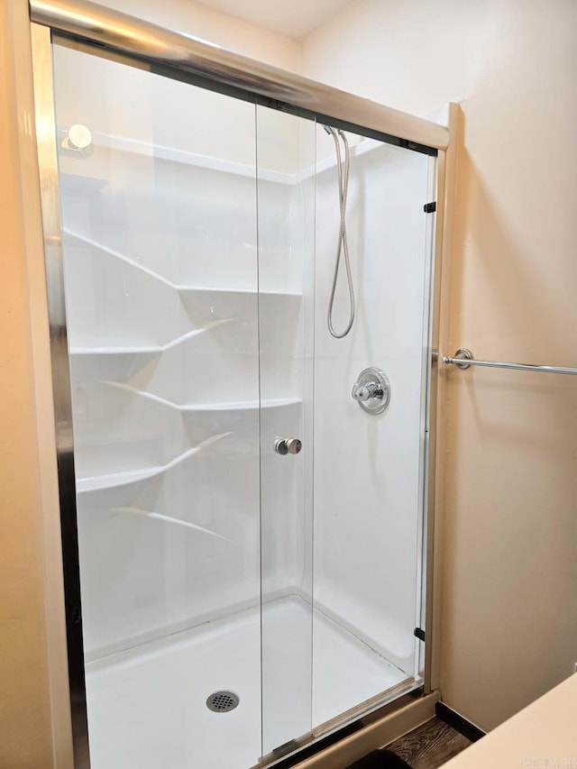 full bathroom with a stall shower