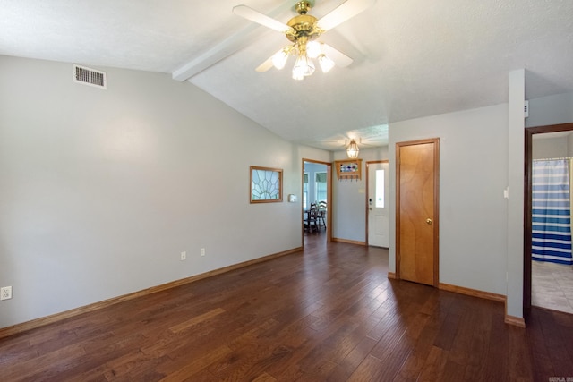 unfurnished room featuring visible vents, vaulted ceiling with beams, baseboards, wood finished floors, and a ceiling fan