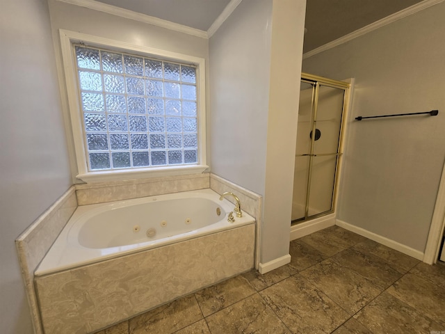 bathroom with baseboards, a jetted tub, a shower stall, and crown molding