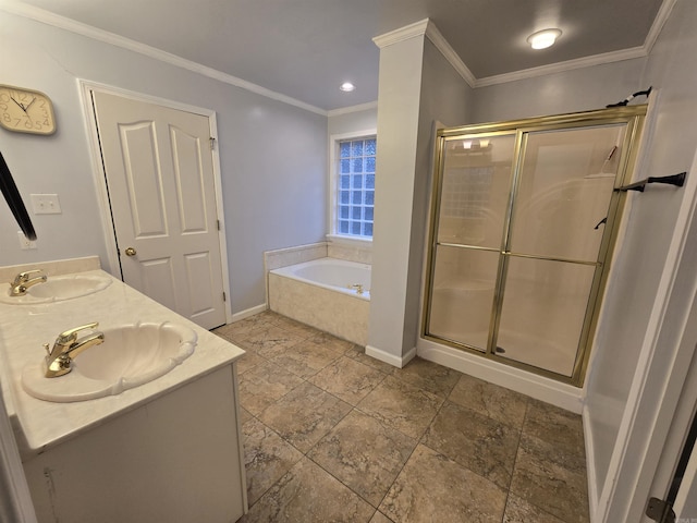 bathroom featuring crown molding, a garden tub, a stall shower, and a sink