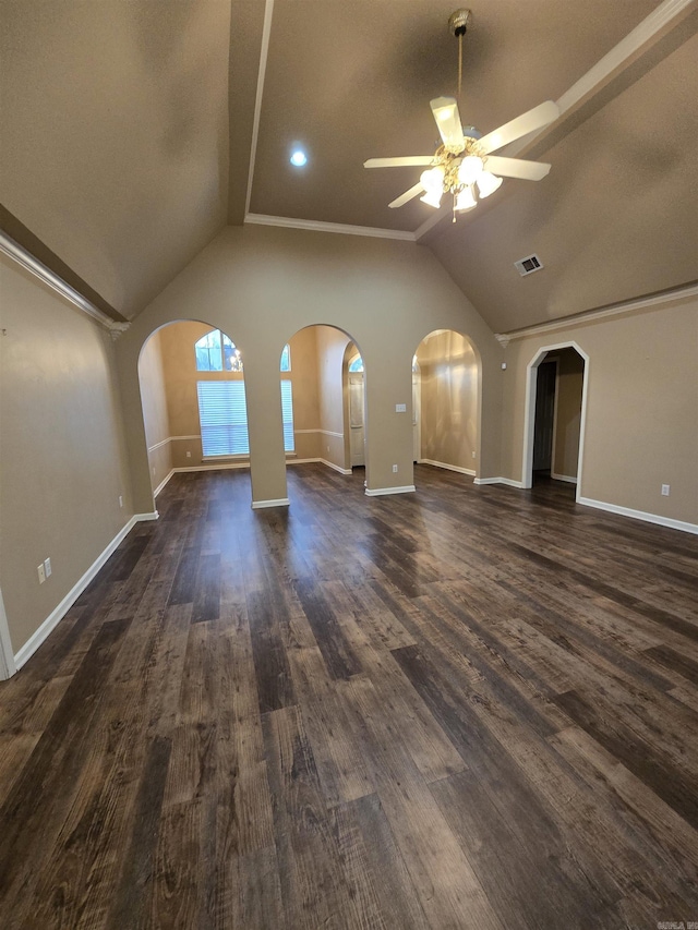 unfurnished living room with visible vents, baseboards, ceiling fan, dark wood finished floors, and lofted ceiling