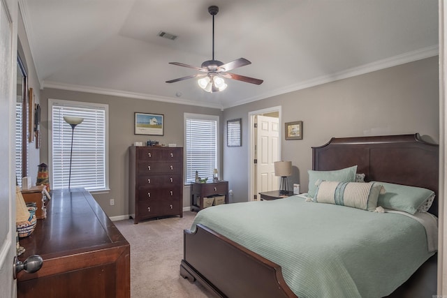 bedroom featuring crown molding, light colored carpet, and visible vents