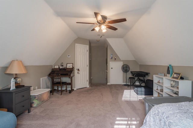 carpeted bedroom with lofted ceiling and ceiling fan