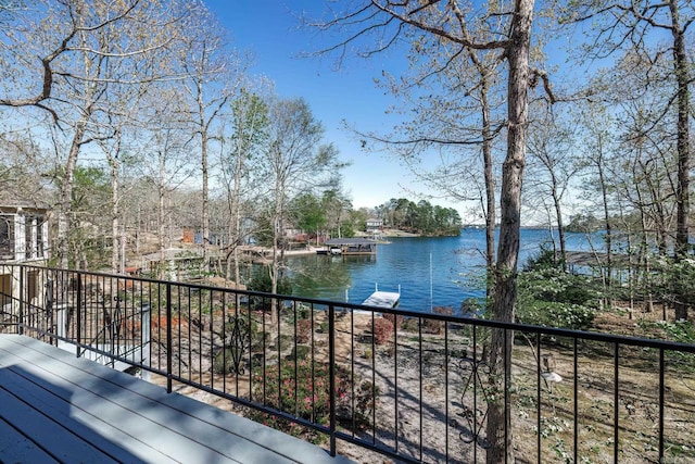 wooden terrace with a water view