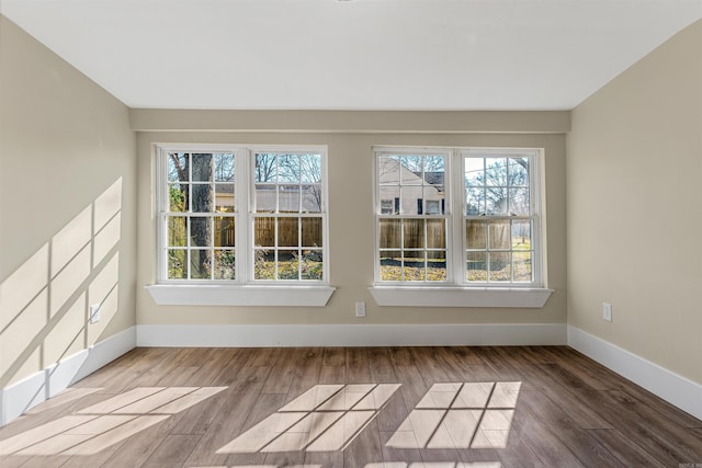 unfurnished sunroom with a wealth of natural light