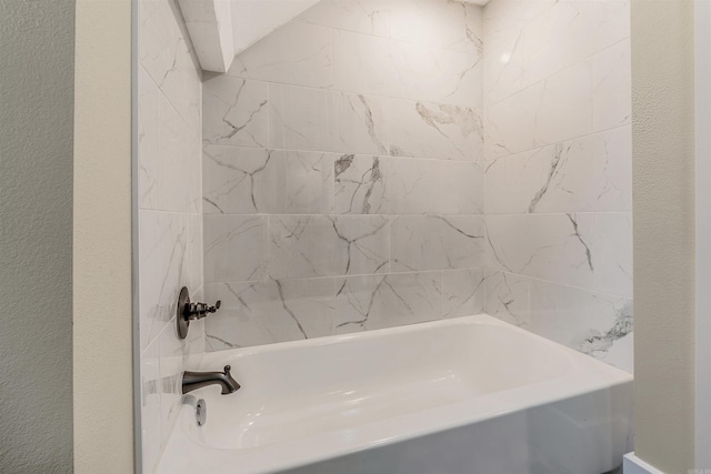 bathroom with a textured wall