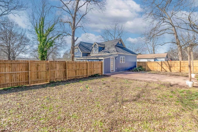 view of yard featuring a patio and a fenced backyard