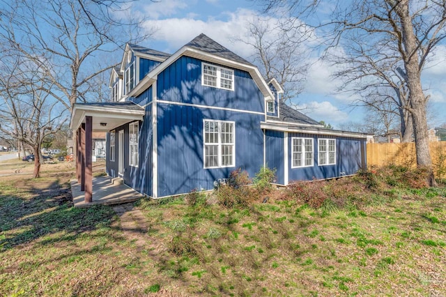 view of side of home featuring board and batten siding