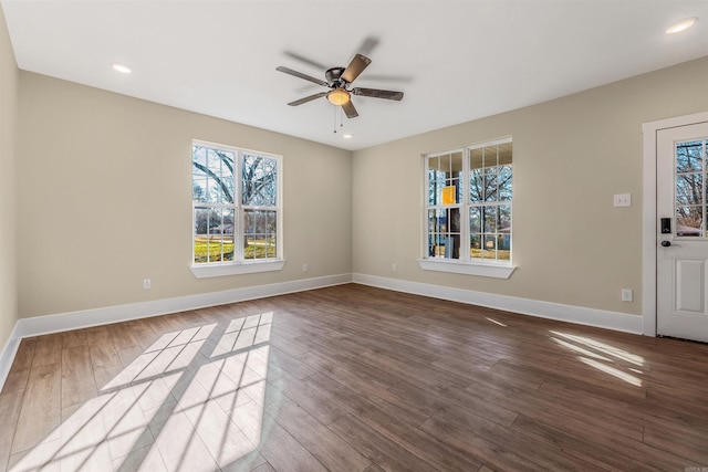 unfurnished room with recessed lighting, baseboards, ceiling fan, and dark wood finished floors