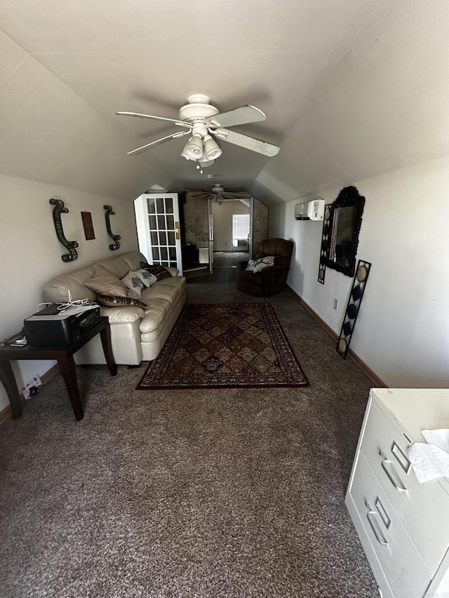 carpeted living room with baseboards, ceiling fan, and vaulted ceiling