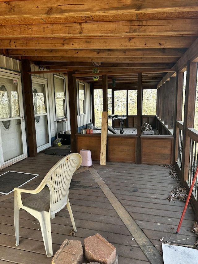 unfurnished sunroom featuring a healthy amount of sunlight