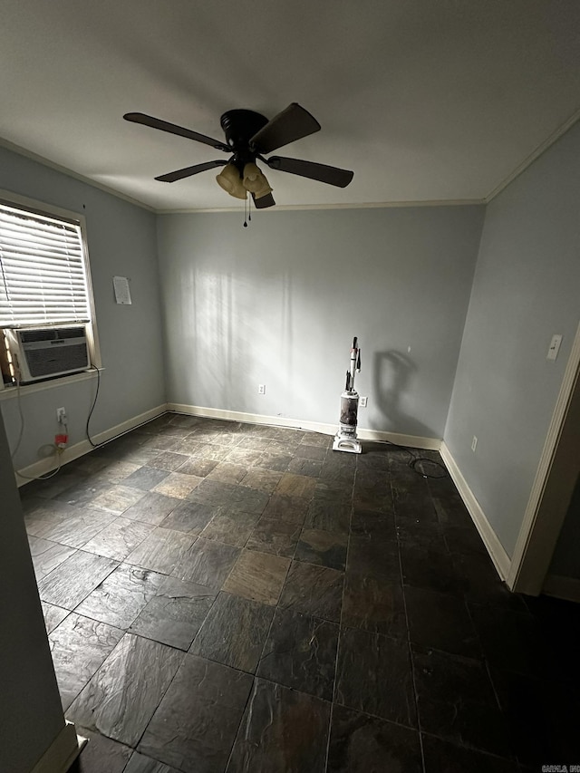 unfurnished room with cooling unit, baseboards, ceiling fan, and ornamental molding