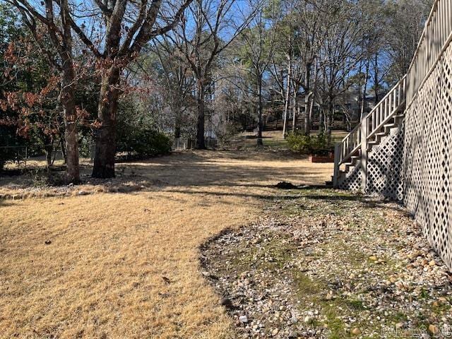 view of yard featuring stairway