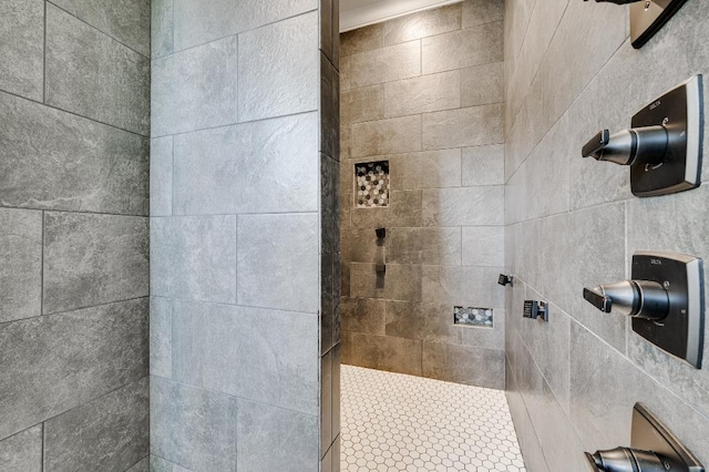 bathroom featuring a tile shower