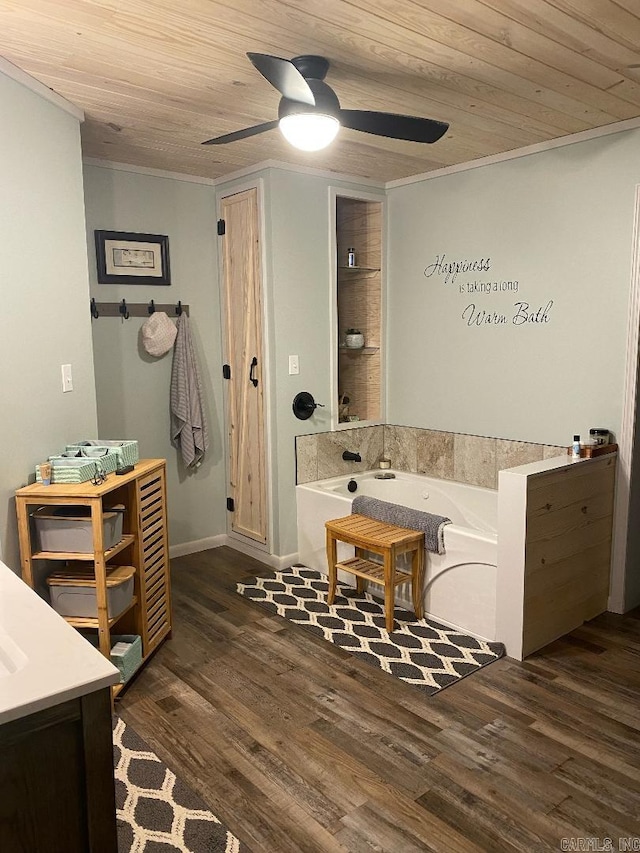 bathroom with ceiling fan, wood finished floors, wooden ceiling, and ornamental molding