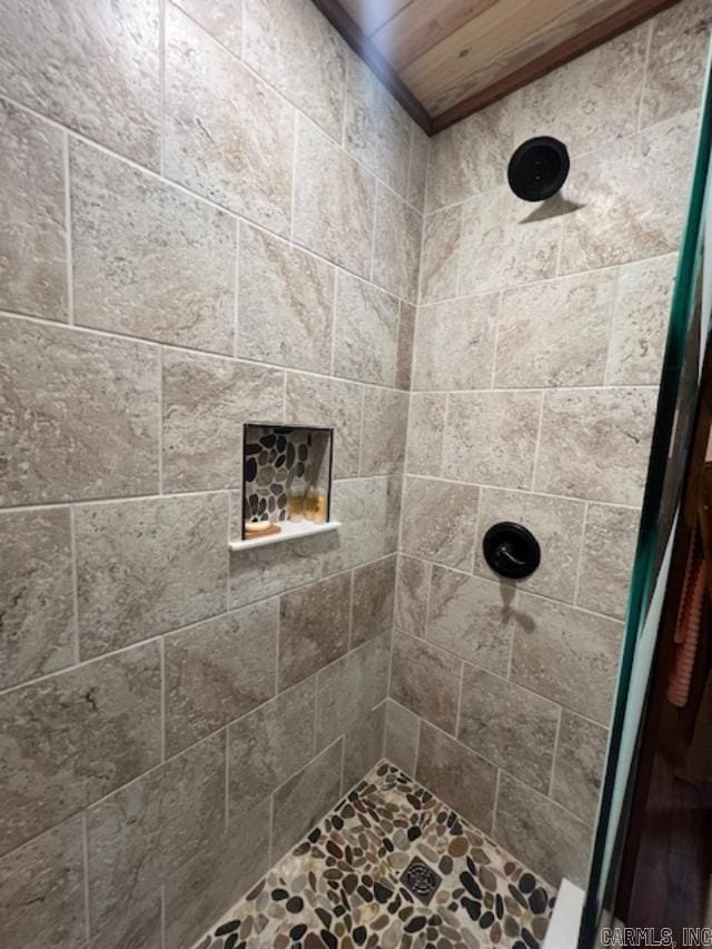 full bath with tiled shower